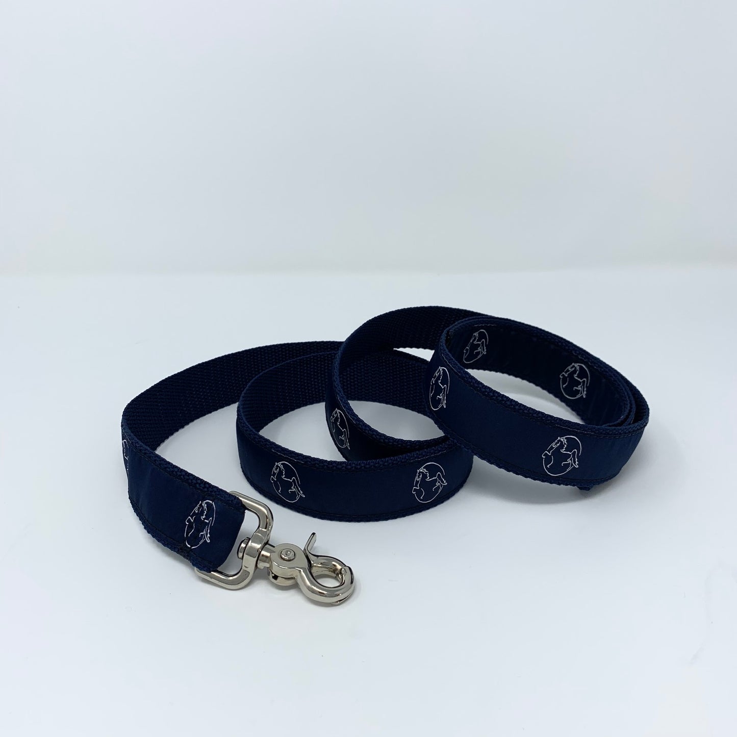 Navy Dog Leash with American Saddlebred Museum Horse Logo Repeated Curled on White Background
