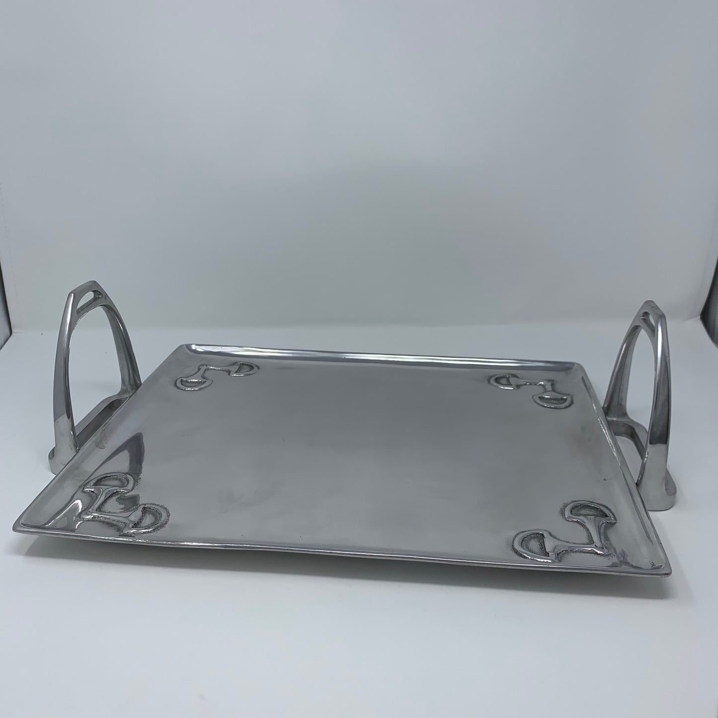 Stirrup Stackable Tray Large Stirrup on Each End as Handle Bit Decoration on Tray in Each Corner